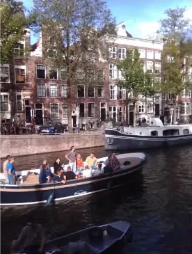 Sample photo: boat on a canal in front of old town houses
